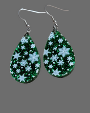 Load image into Gallery viewer, Snowflakes on green glitter
